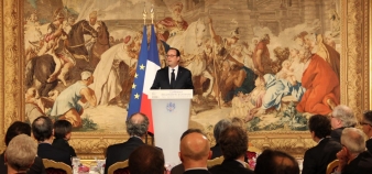 François Hollande recevait les présidents d'université à l'Élysée lors d'un dîner le 12 décembre 2014